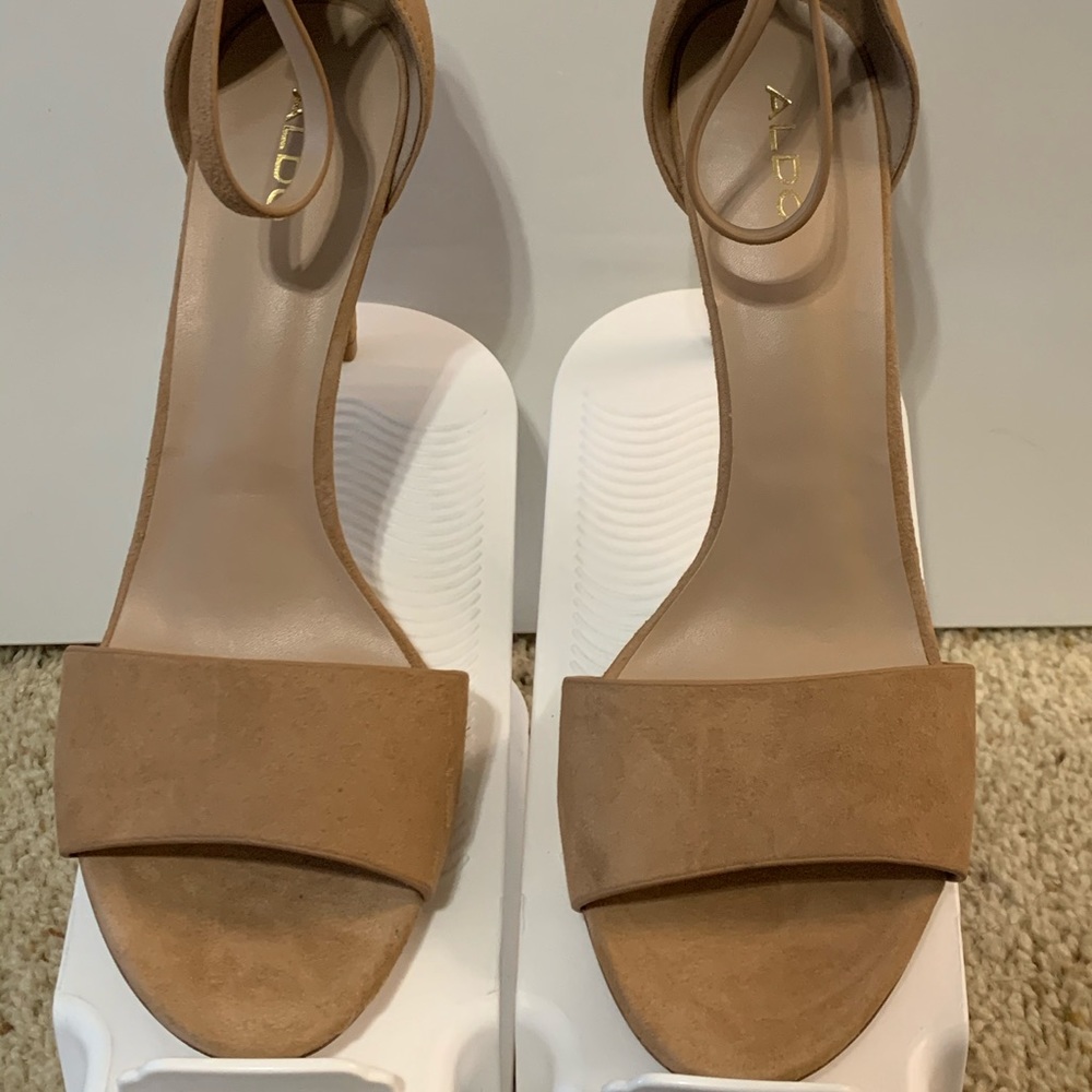 Beige suede pumps
